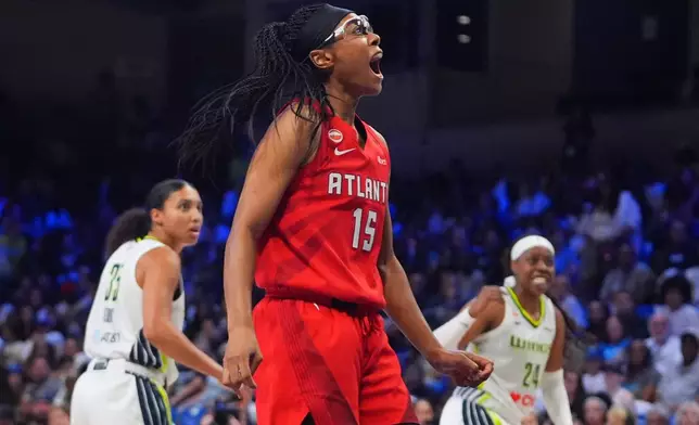 Atlanta Dream guard Allisha Gray (15) reacts to scoring a basket during the second half of a WNBA basketball game against the Dallas Wings in Arlington, Texas, Wednesday, July 29, 2026. (AP Photo/LM Otero)