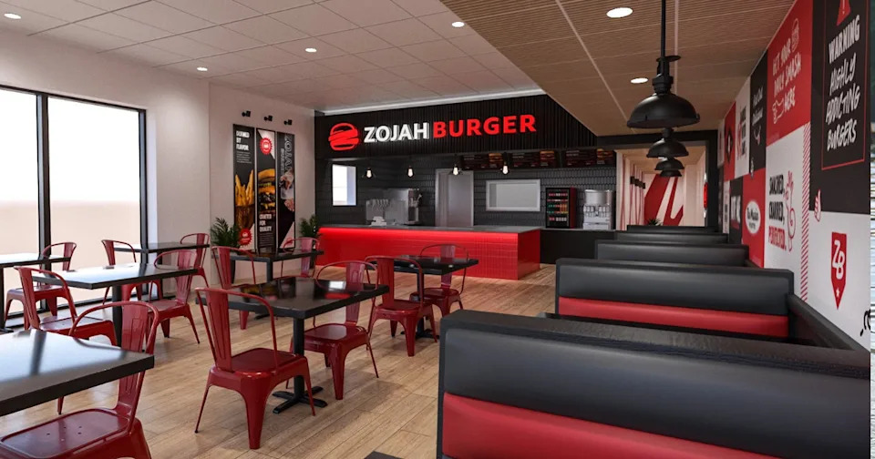 Interior of ZOJAH Burger in San Antonio. Everything is black and white and red. No customers or employees are present.