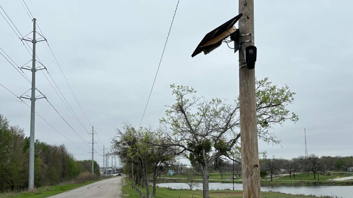 A license plate reading camera manufactured and operated by Flock Safety installed on a utility pole near Echo Lake in south-central Fort Worth. A license plate reading camera manufactured and operated by Flock Safety installed on a utility pole near Echo Lake in south-central Fort Worth.