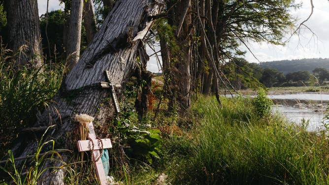 HUNT, TEXAS - JULY 1: A small make shift memorial for victims that died during the July 4 floods last year in Hunt, Texas, US, on Wednesday, July 1, 2026.