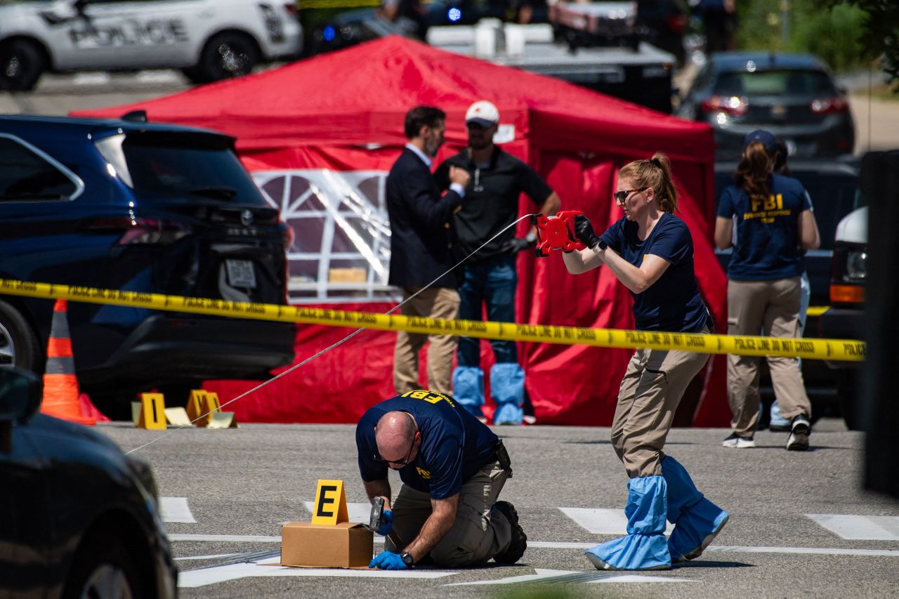 FBI investigators work the scene of an ICE shooting in Biddeford, Maine, on Monday.