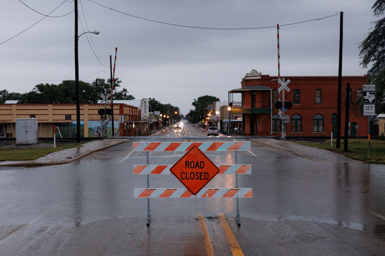 A section of a street in Sabinal, Texas, is closed due to rising flood waters across Uvalde County on Wednesday.