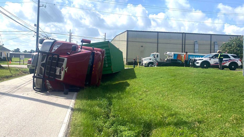 A tractor trailer is seen on its side after a crash in the Willowbrook area of Harris County, Texas, on July 29, 2026.