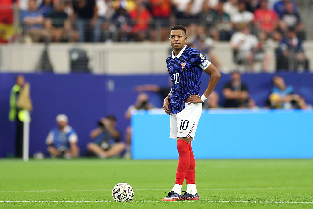 ARLINGTON, TEXAS - JULY 14: Kylian Mbappe #10 of France reacts after conceding Spain's second goal to Pedro Porro #12 during the FIFA World Cup 2026 Semi Final match between France and Spain at Dallas Stadium on July 14, 2026 in Arlington, Texas. (Photo by Florencia Tan Jun/Getty Images)