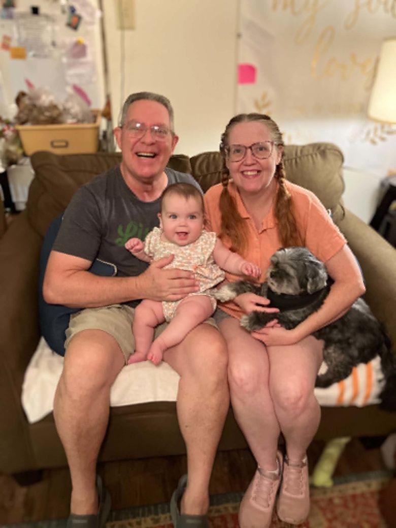 Jennie and Mark Steward with their granddaughter Ellie, who was Mark's