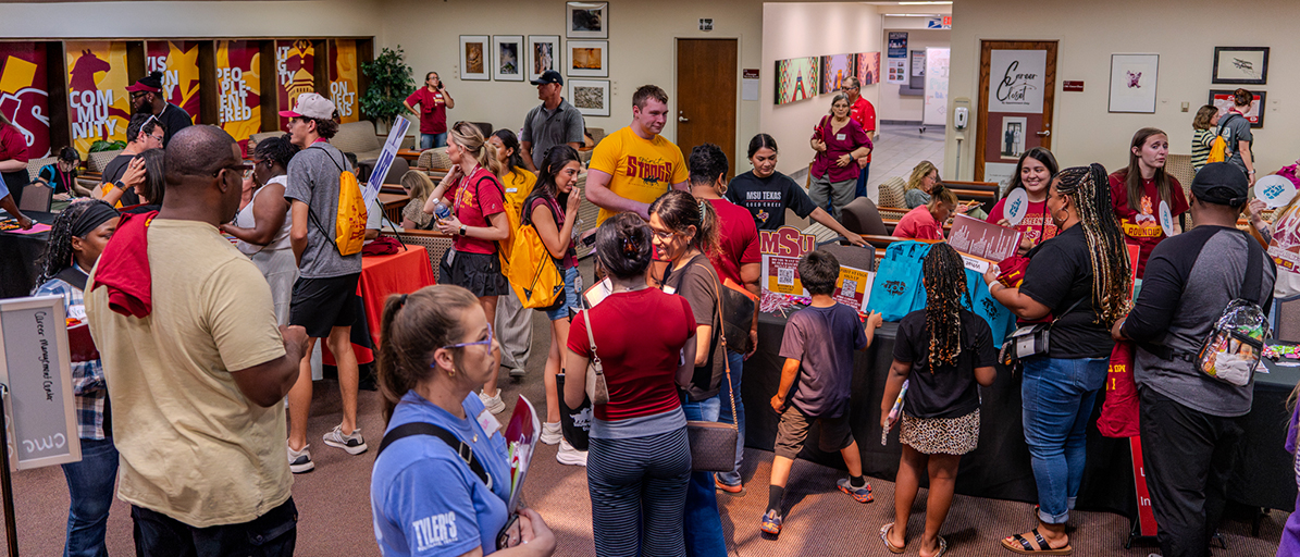 Large group inside at New Student Orientation