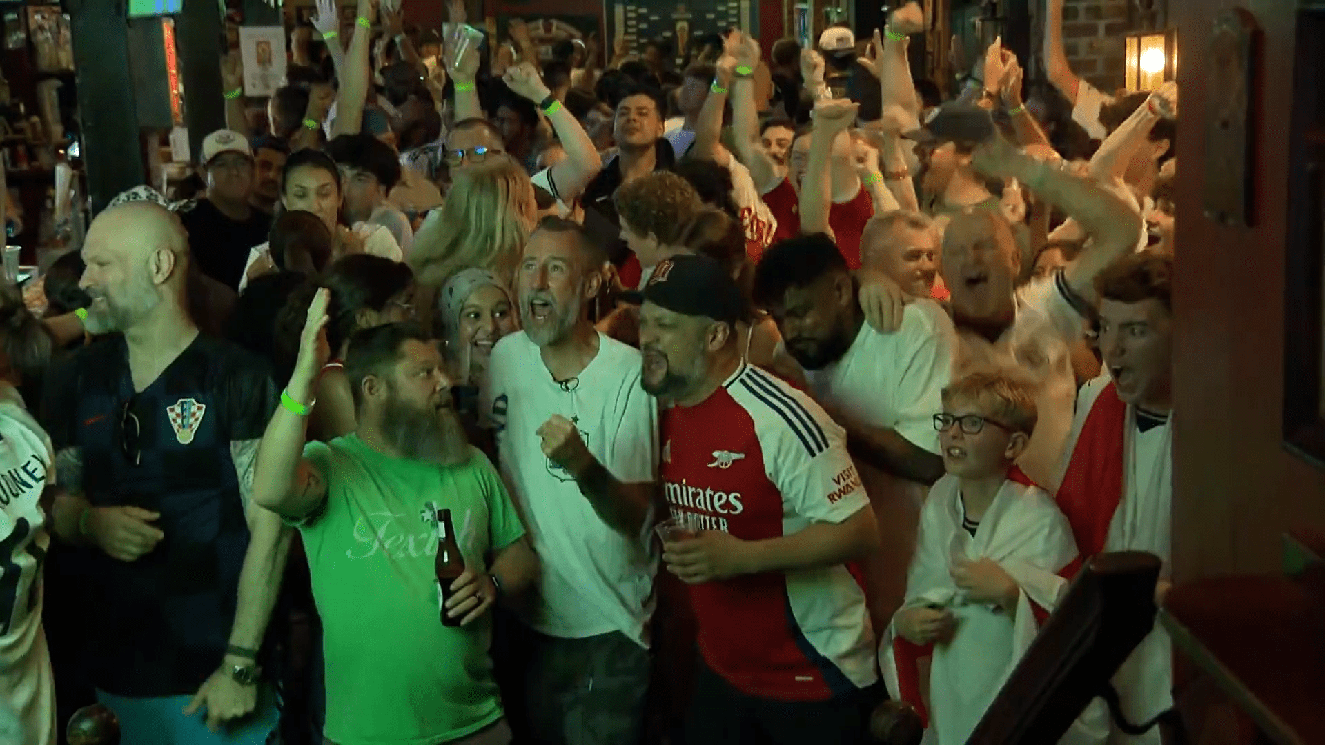 England fans celebrate one of their four goals against Croatia at Dallas' Londoner Pub's World Cup watch party. The Londoner reached capacity as supporters cheered England's 4-2 win.
