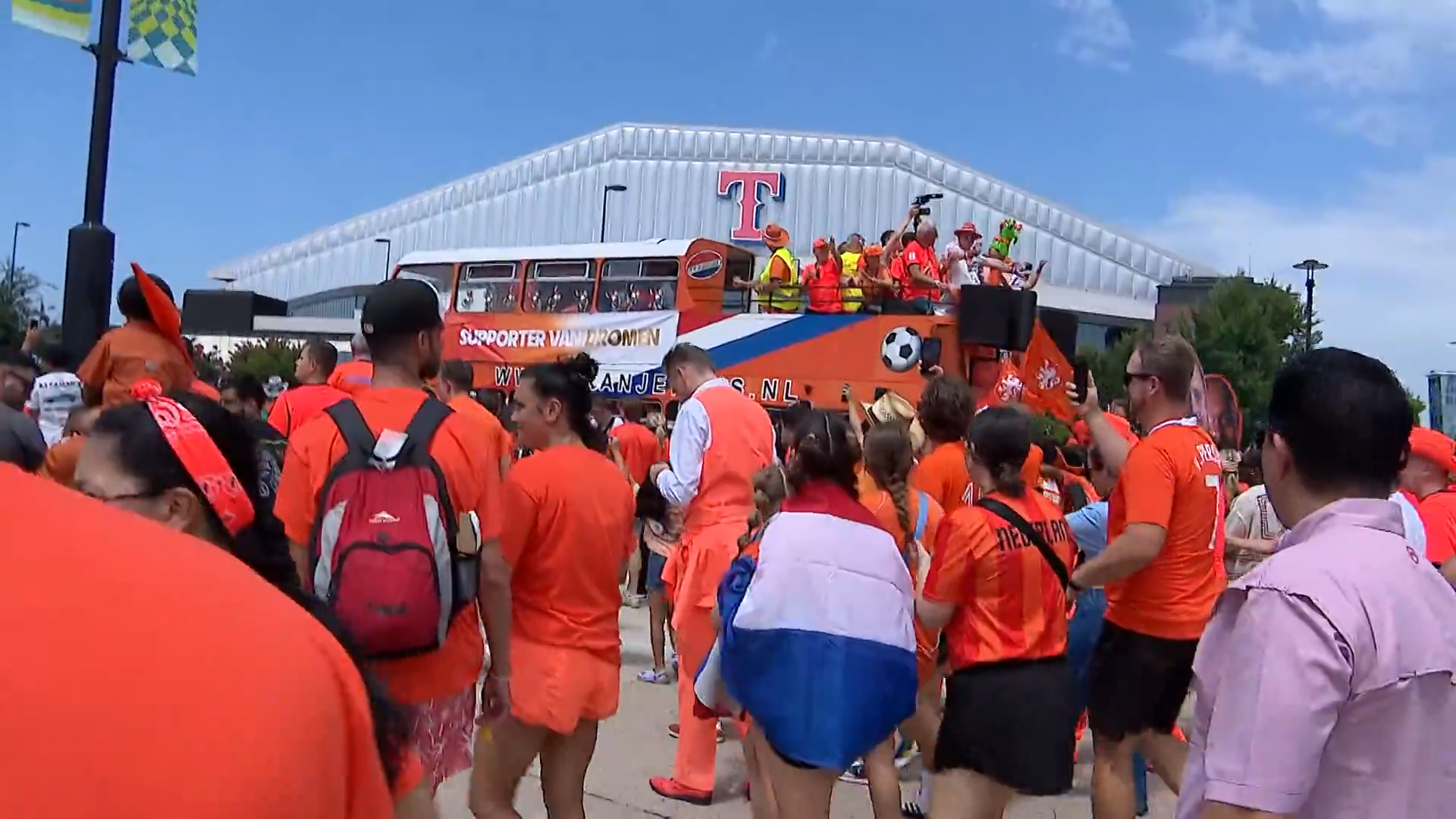 Dutch fans take over Arlington with “Orange Fanwalk” and the Dutch Orange Bus outside Globe Life Field. The Netherlands played Japan at Dallas Stadium before taking on Sweden and Tunisia in Group F play.