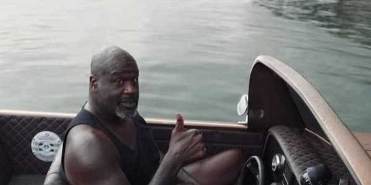 Shaquille O'Neal cruises Dallas lake in Chevy Impala boat