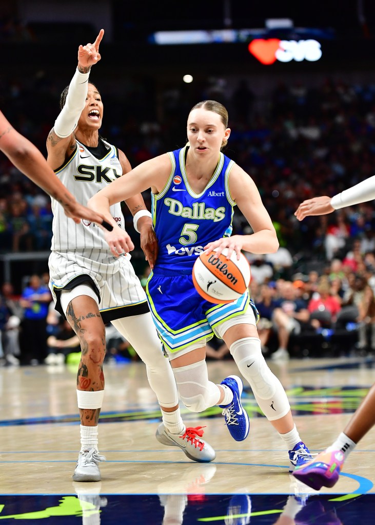 Paige Buckers (5) of the Dallas Wings drives against the Sky on July 12, 2026.