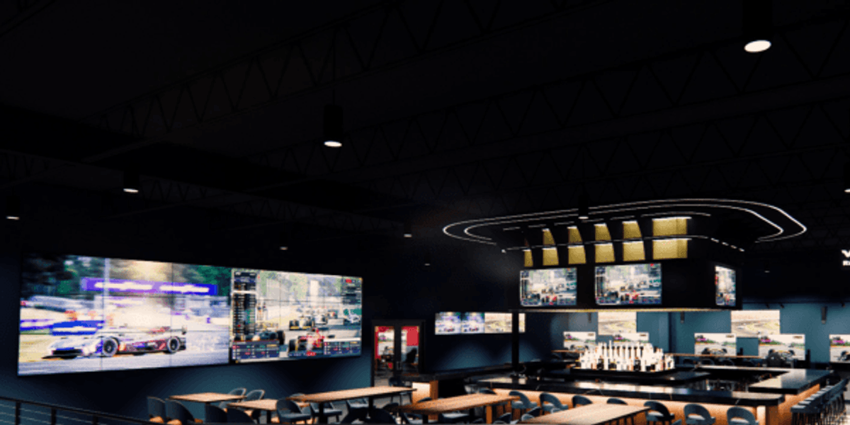 High-tech Velocity racing simulator lounge zooms into Dallas