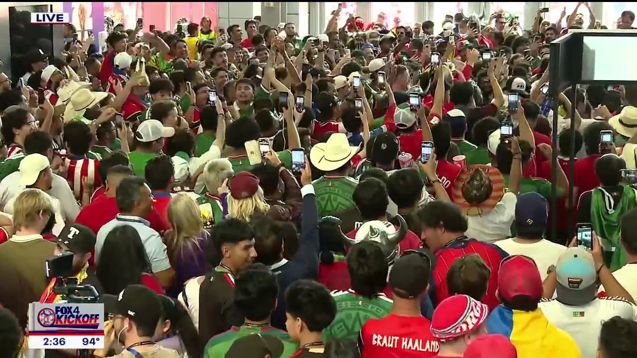 Norway fans celebrate in concourse of Dallas Stadium