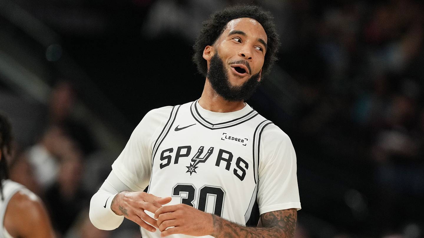 Oct 17, 2025; San Antonio, Texas, USA; San Antonio Spurs forward Julian Champagnie (30) reacts after scoring a three point basket during the second half against the Indiana Pacers at Frost Bank Center. Mandatory Credit: Scott Wachter-Imagn Images