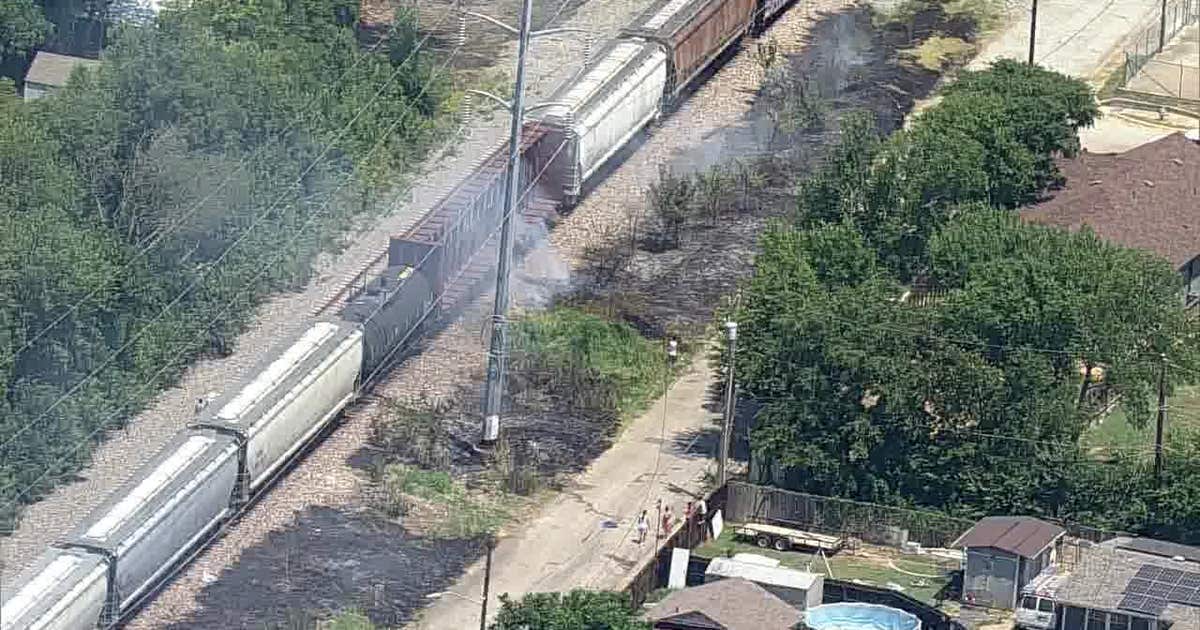 Fire burns along train tracks in Fort Worth