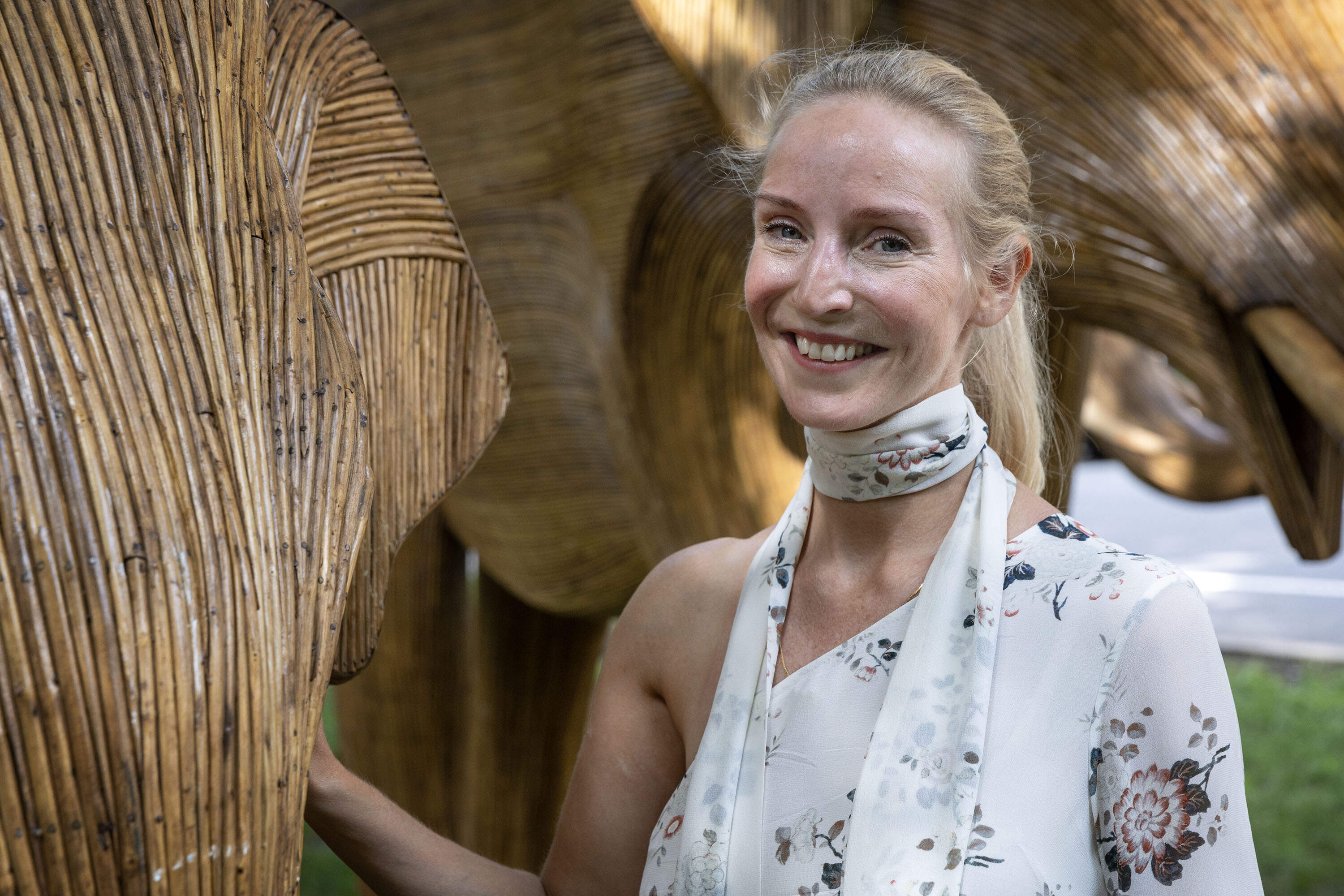 Ruth Ganesh, a co-founder of The Great Elephant Migration, an installation of 100 life-sized elephant sculptures that has appeared across the U.S. (Robin Lubbock/WBUR)
