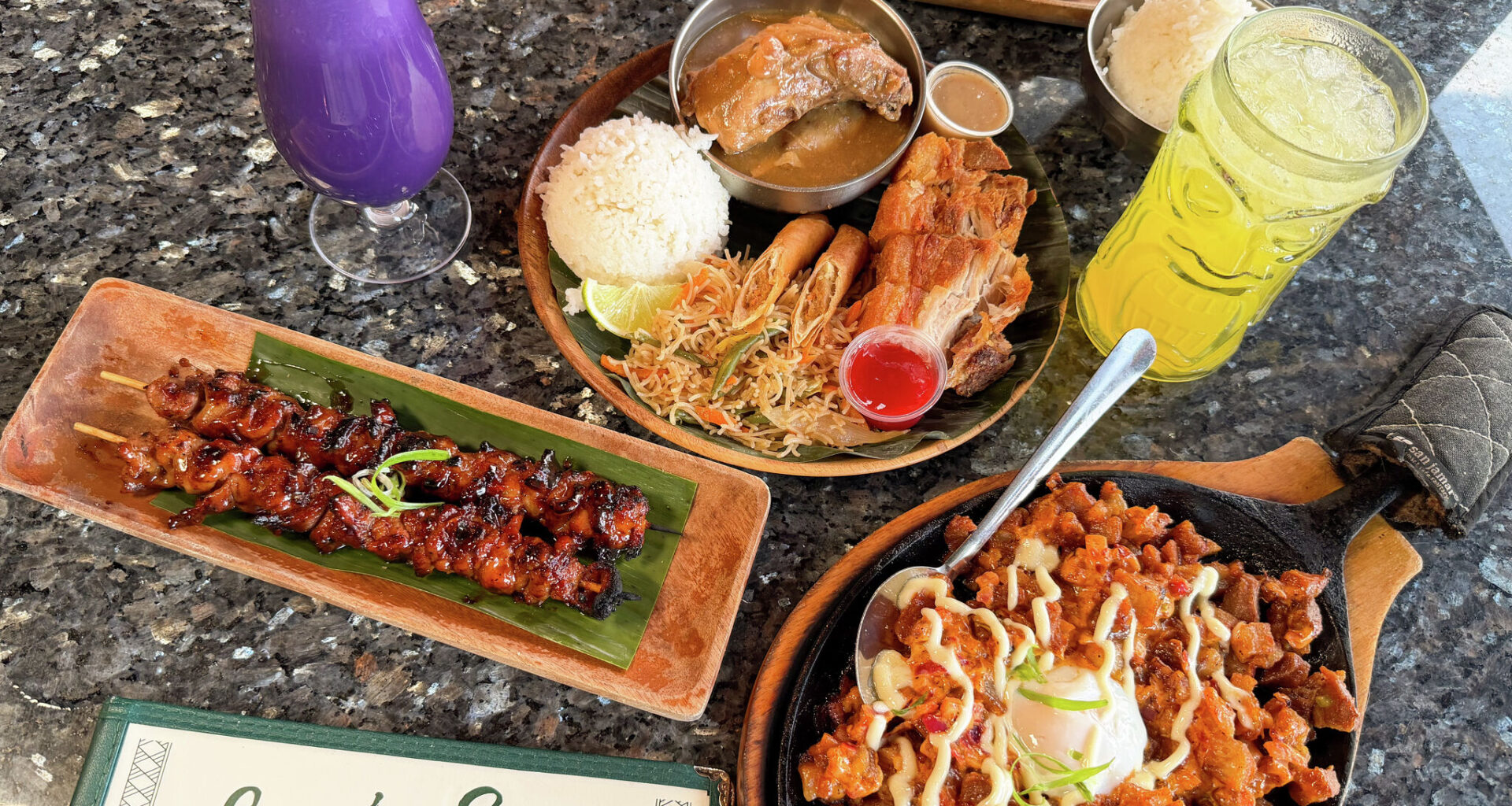 A spread of Filipino dishes and drinks that can be found at Sari-Sari.
