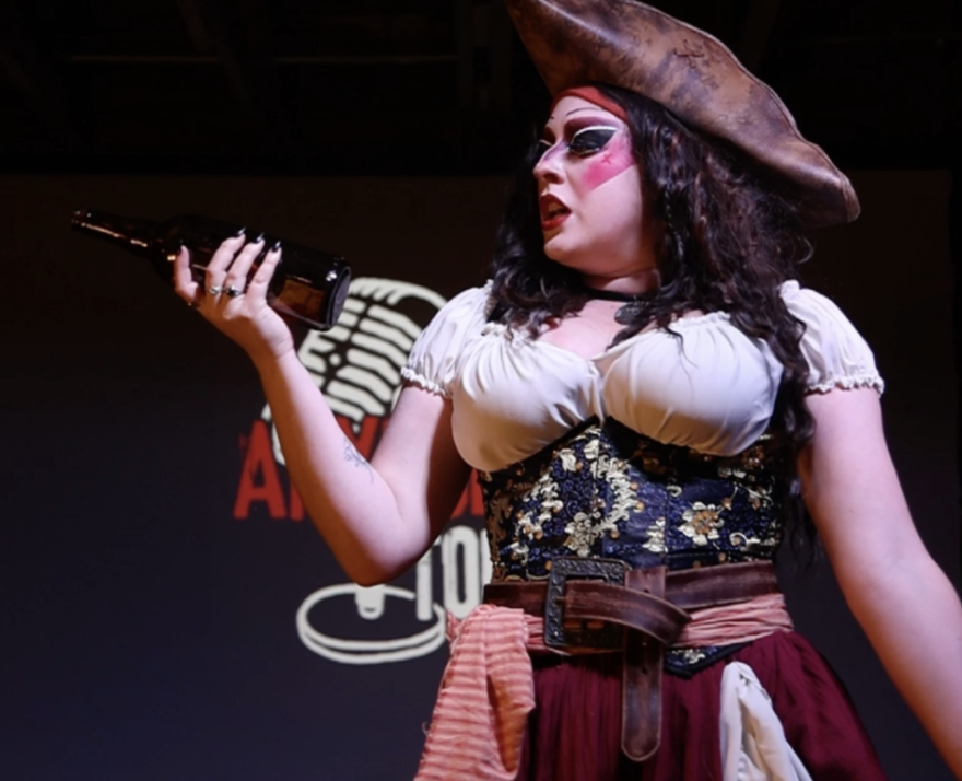 Drag queen Ruby Chest closes out the show with a short performance.