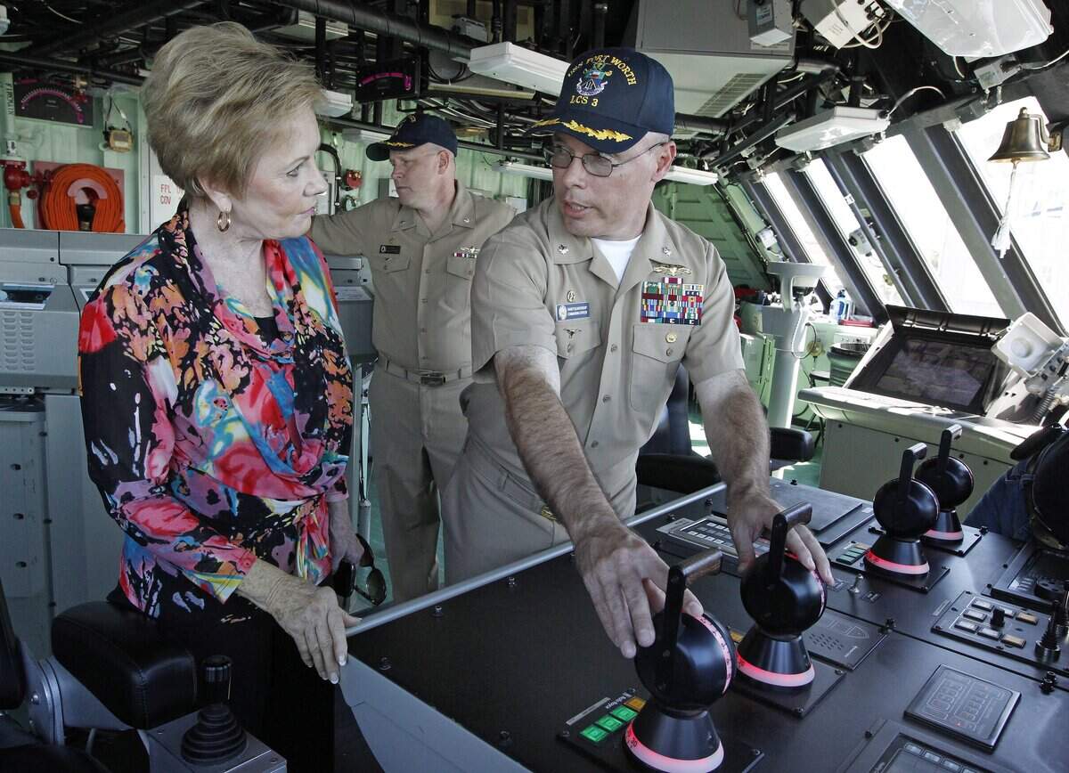 Congresswoman Kay Granger, left, gets a tour of the bridge of the USS Fort Worth from commanders Randy Blankenship, right, and Warren Cupps in Galveston in 2012.