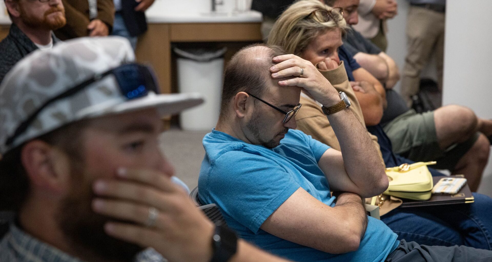 Audience members react to a Planning and Zoning Commission meeting in Westlake where the commission voted to recommend a new data center that would border Keller, Tuesday, Aug. 4, 2026.