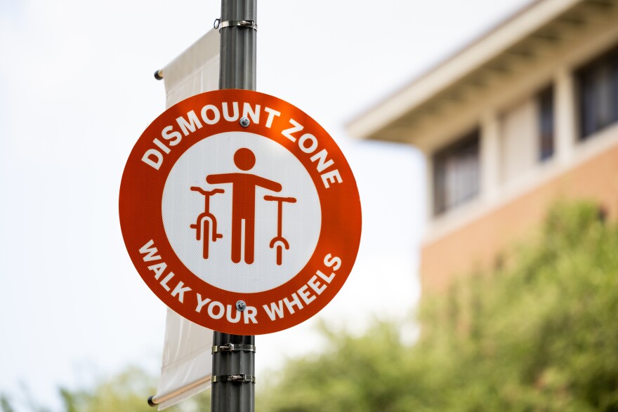 A dismount zone is pictured on Speedway at The University of Texas at Austin