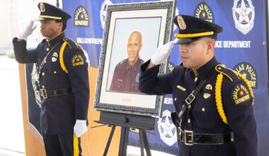 The Dallas police honor guard unveils a portrait honoring Dallas police Officer Burks, who was killed in 2024, during a ceremony at the South Central Division in Dallas, Friday, Aug. 7, 2026.