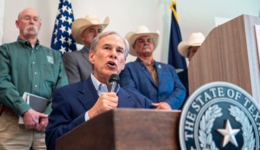 Texas Gov. Greg Abbott speaking at a podium.