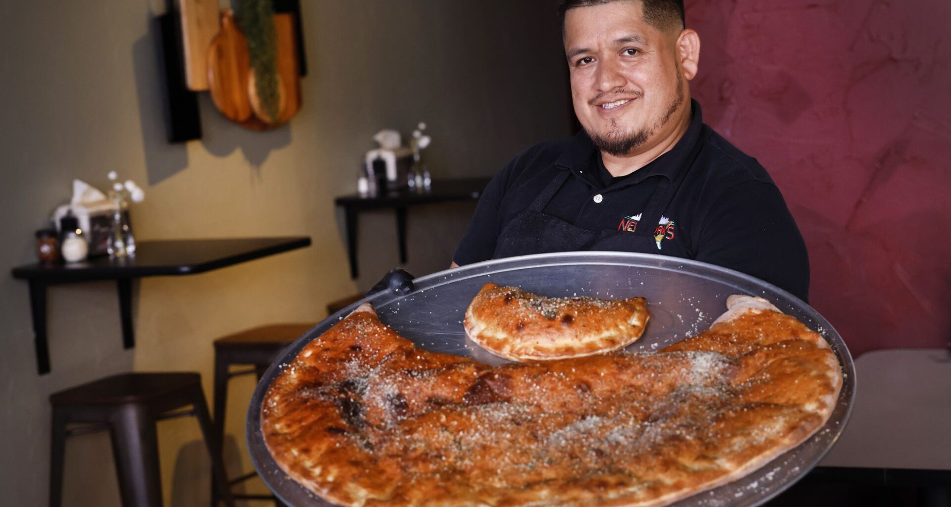 Viral giant calzone draws diners to Arlington, Texas pizza shop