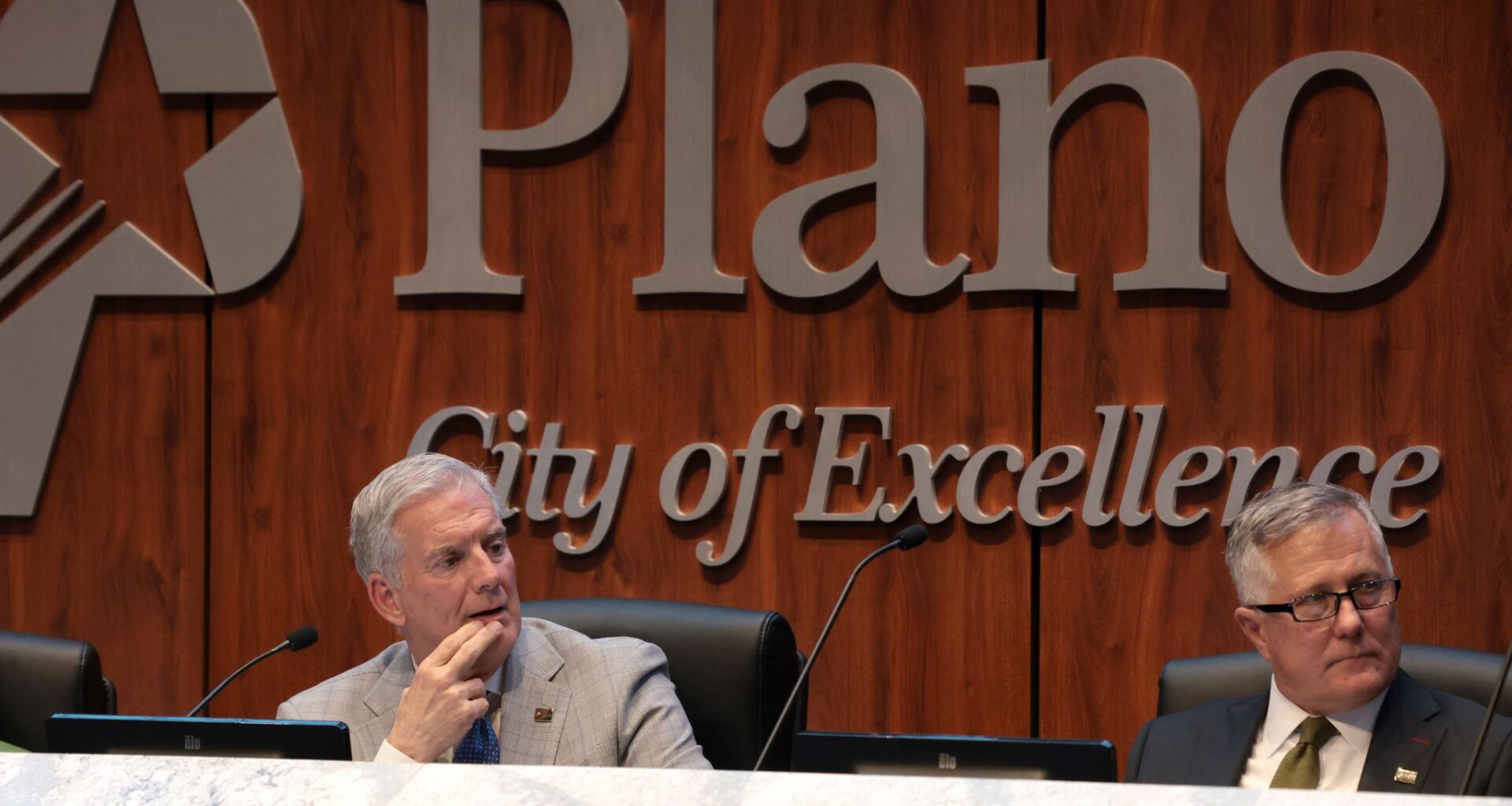 Michael Platt, (right), Executive Vice President of Mixed-Use Development at Centennial Real Estate discusses about the renderings with residents during a community open house events regarding the Dallas Stars arena project at the Shops at Willow Bend mall, on Wednesday, July 8, 2026 in Plano.