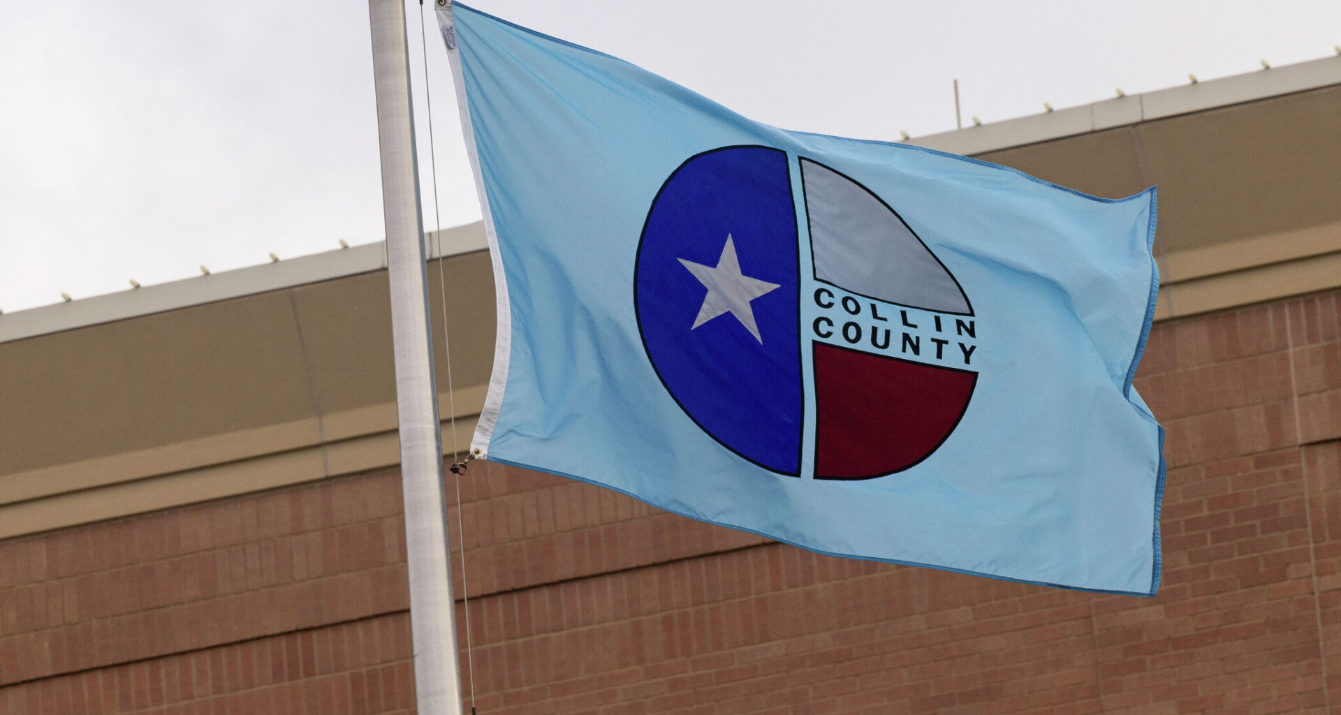The Collin County flag flies over the Collin County Courthouse on Tuesday, June 9, 2026. 