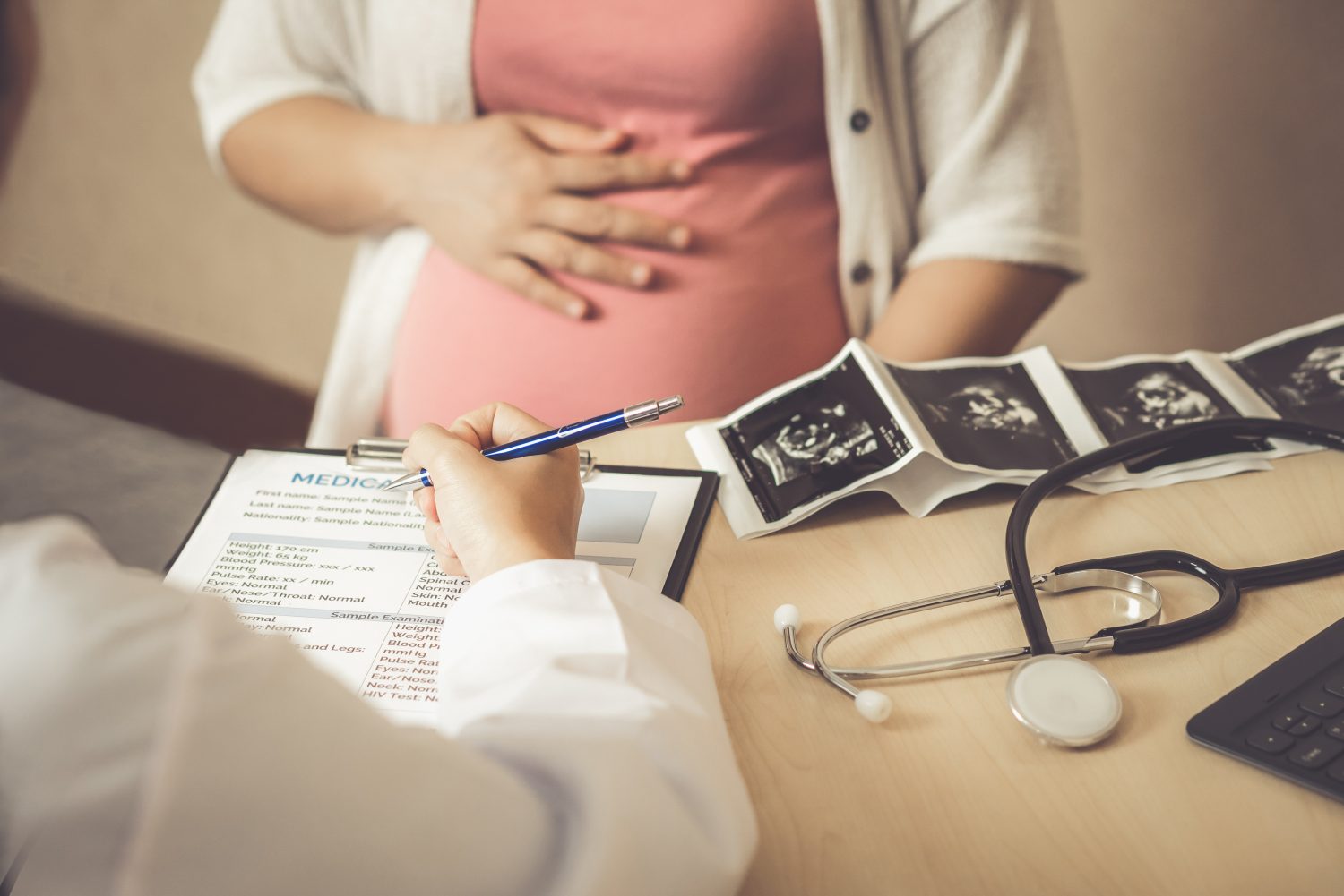 pregnant mother at doctors office