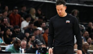 San Antonio Spurs coach Mitch Johnson speaks to Texas football team