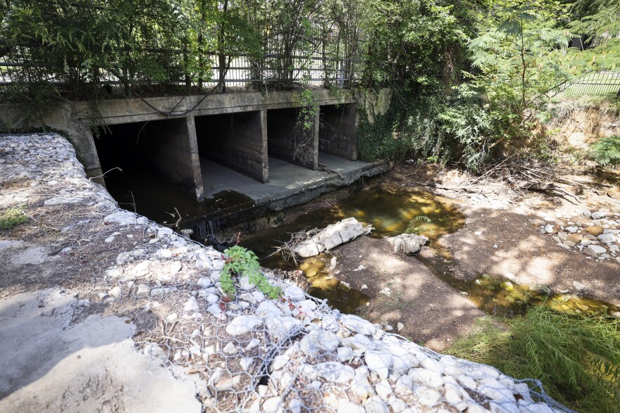 Water eroded under the base of the Lamar Street due to stormwater erosion Monday, July 20, 2026, in Arlington.