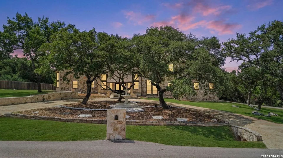 This hilltop mansion for sale in San Antonio has a secret grotto that lets you swim into an interior living area