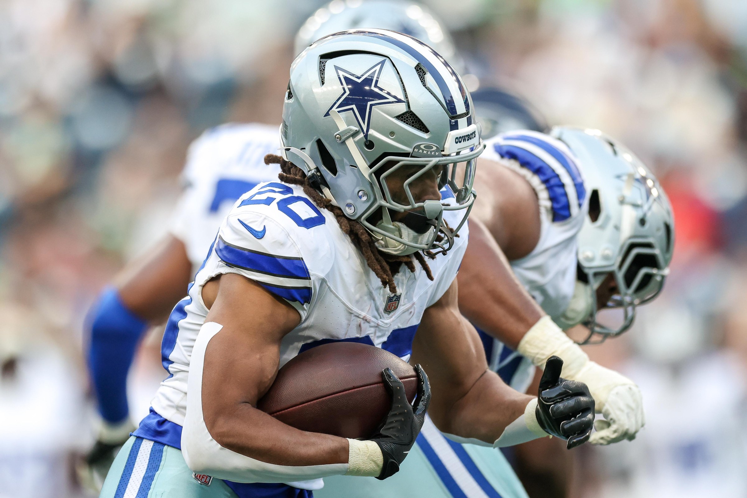 SEATTLE, WASHINGTON - AUGUST 15: Malik Davis #20 of the Dallas Cowboys runs with the ball during the third quarter during the NFL preseason game against the Seattle Seahawks at Lumen Field on August 15, 2026 in Seattle, Washington. (Photo by Jack Compton/Getty Images)