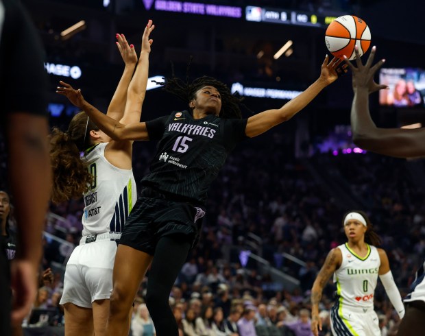 Golden State Valkyries' Tiffany Hayes (15) passes the ball against Dallas Wings' Maddy Siegrist (20) in the second quarter at the Chase Center in San Francisco, Calif., on Monday, Aug. 17, 2026. (Nhat V. Meyer/Bay Area News Group)