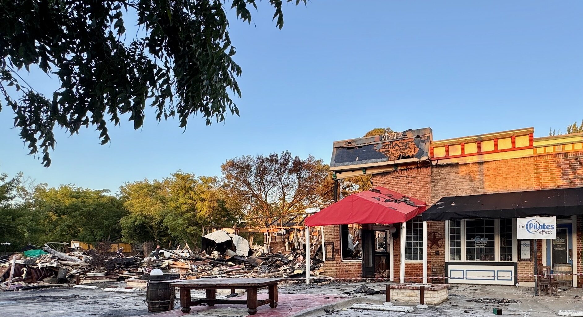 a fire devastated two restaurants in Arlington Monday afternoon.