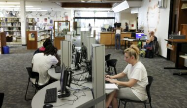 People work at the computer station in the Martin Luther King Jr. Branch Library, on Thursday, March 5, 2026 in Dallas.