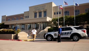 A member of the sheriff department stands outside before a hearing on Karmelo Anthony's motion for a new trial at the Collin County Courthouse in McKinney, Texas, Thursday, Aug. 20, 2026. Anthony was convicted of murder in June and sentenced to 35 years in prison for the fatal stabbing of Austin Metcalf at a high school track meet in Frisco.