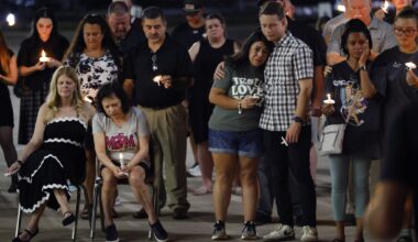 Friends and family of Marine Pvt. Aiden Craig, including his mother Lisa Craig (seated, second from left) came together at Wylie High School for a candlelight vigil  August 21, 2026. Craig died during a physical training evaluation at Camp Pendleton.