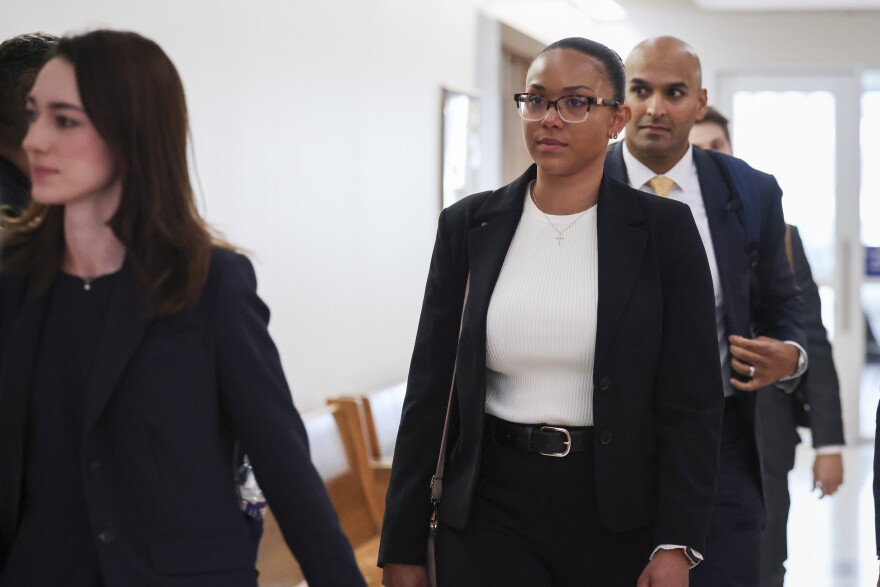 Surrogate McKenna West leaves at the end of the hearing regarding a temporary restraining order Tuesday, Aug. 25, 2026, in Dallas.