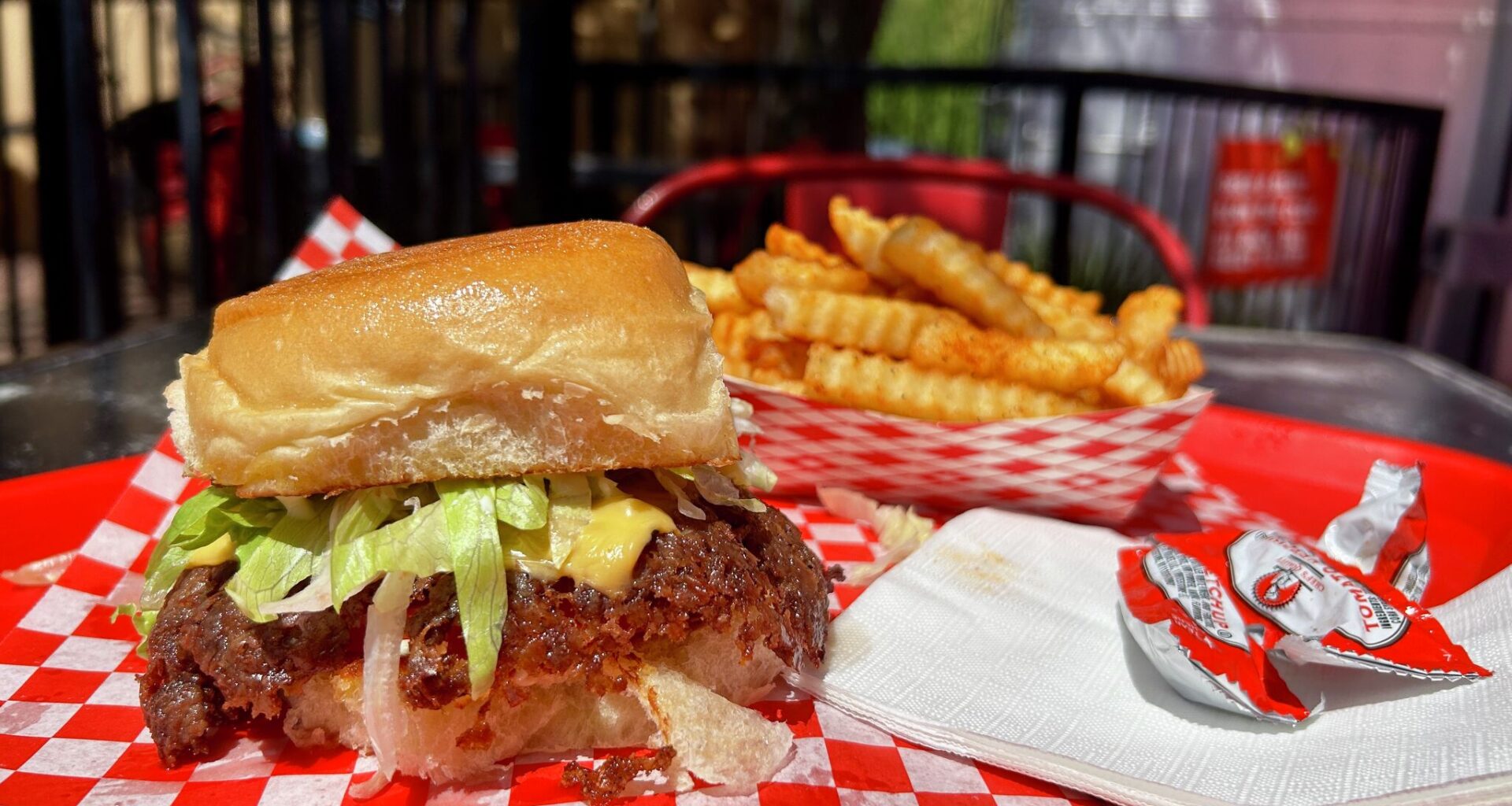 Krazy Katsu serves up smashburgers and seasoned fries from its train car location.