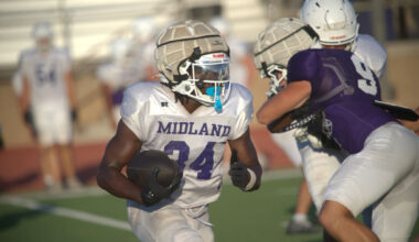 Midland High running back Evan Taylor carries the football during practice, Aug. 24, 2026, at Memorial Stadium. 