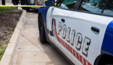 A man died after his sedan crashed into a dumpster enclosure.