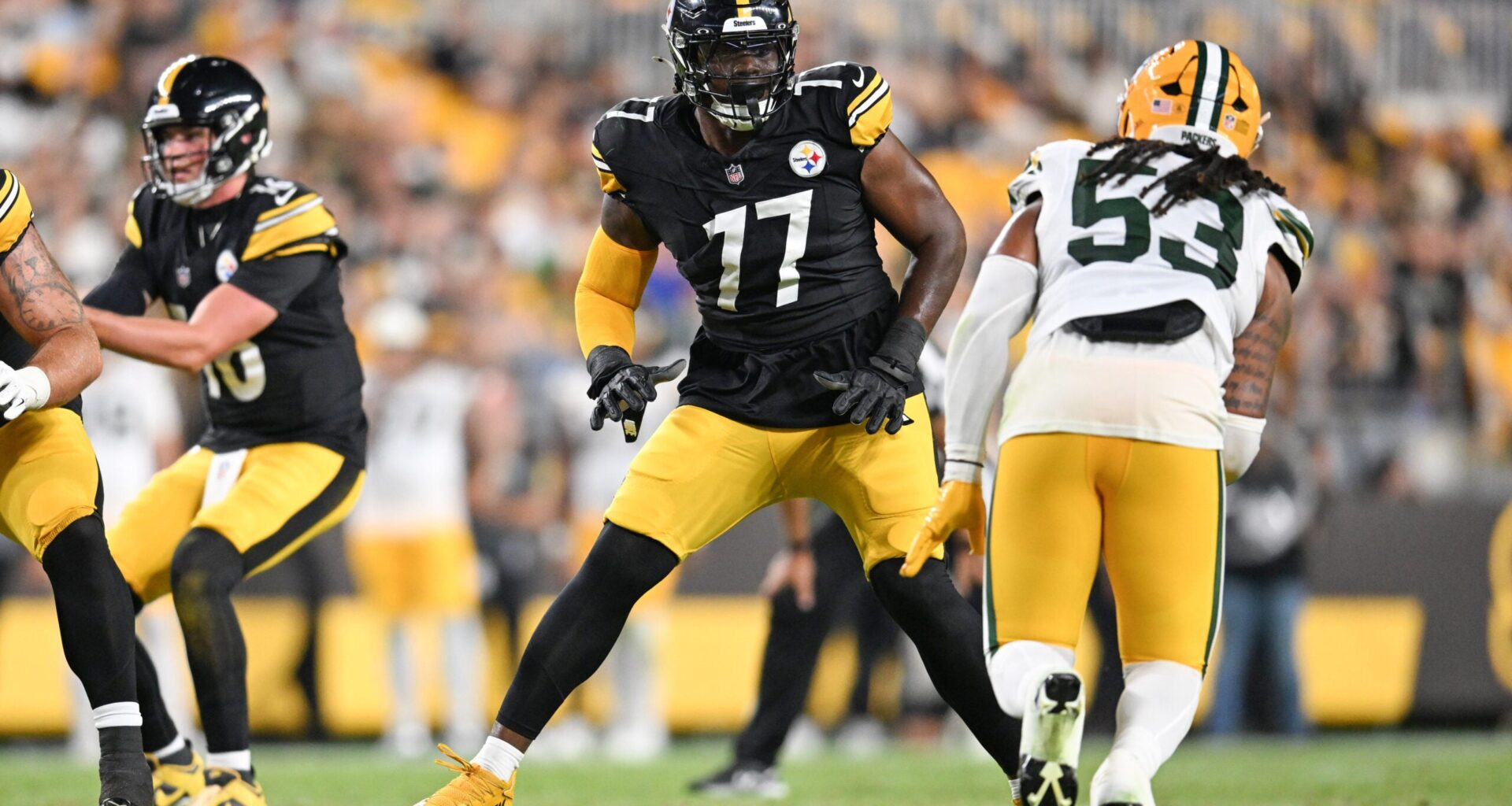 Aug 13, 2026; Pittsburgh, Pennsylvania, USA; Pittsburgh Steelers offensive tackle Broderick Jones (77) looks to block Green Bay Packers defensive end Arron Mosby (53) during the second half at Acrisure Stadium.