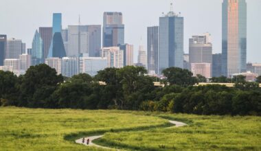 Bicyclists pass along the Trinity Skyline Trail during a warm summer day, on Wednesday, July 29, 2026 in Dallas.