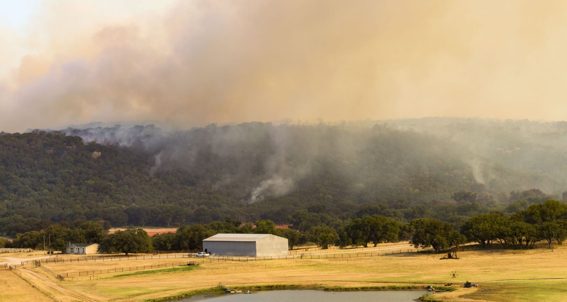 Black smoke emerge from Ross fire spreading across the ridge, on Friday, Aug. 28, 2026 in Palo Pinto.