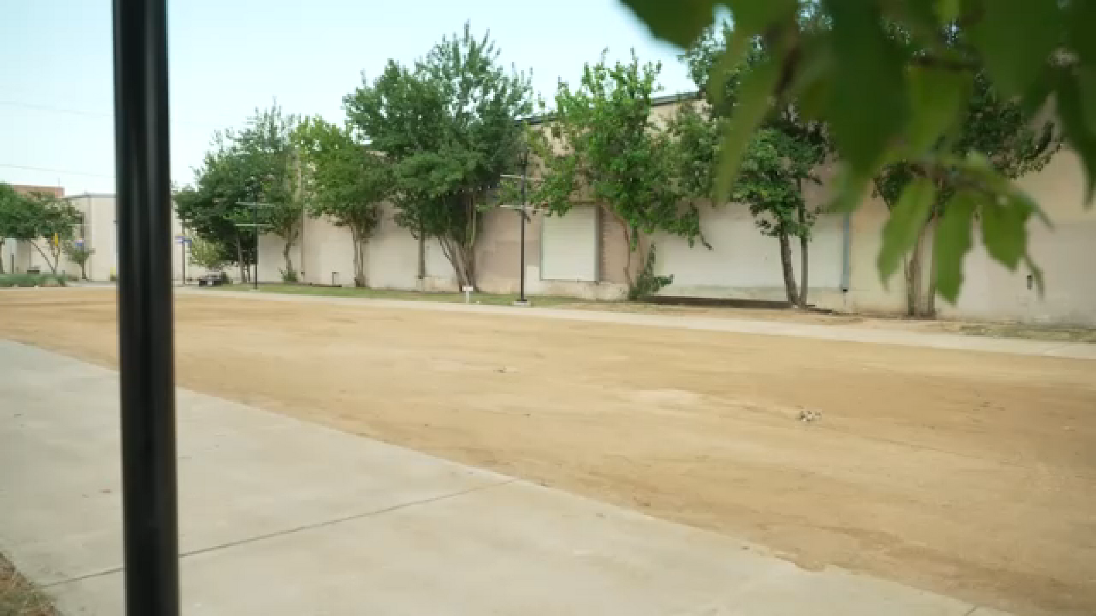 Houston's East Downtown residents question decision to replace grass at Bastrop Promenade with crushed granite
