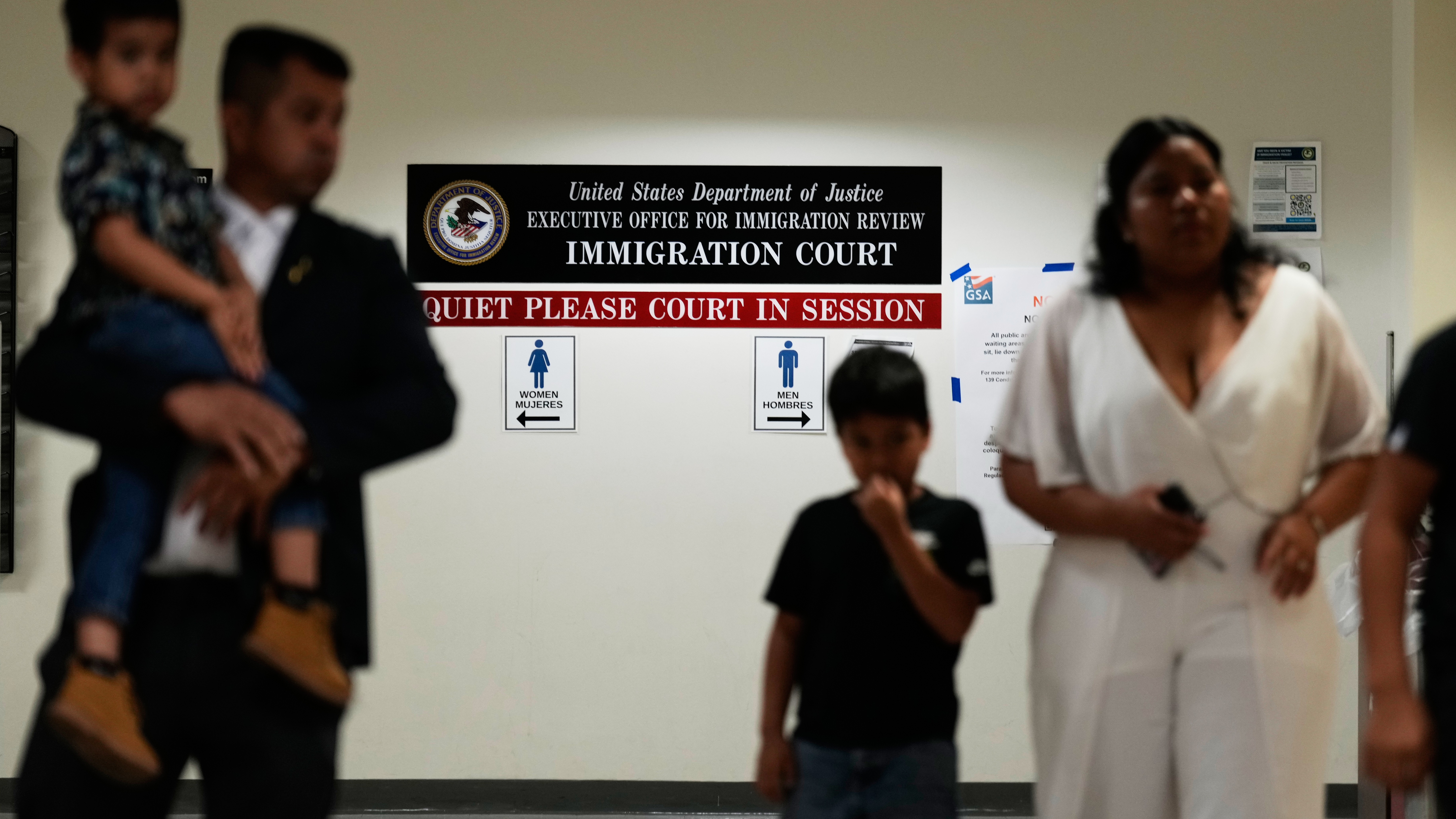 People arrive for immigration court hearings in New York, Monday, July 27, 2026.