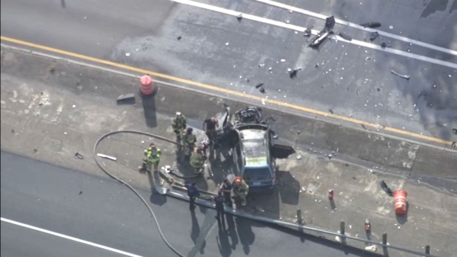 Crews working to clear scene on US-59 and Bissonnet Street after single car fire causes heavy backups