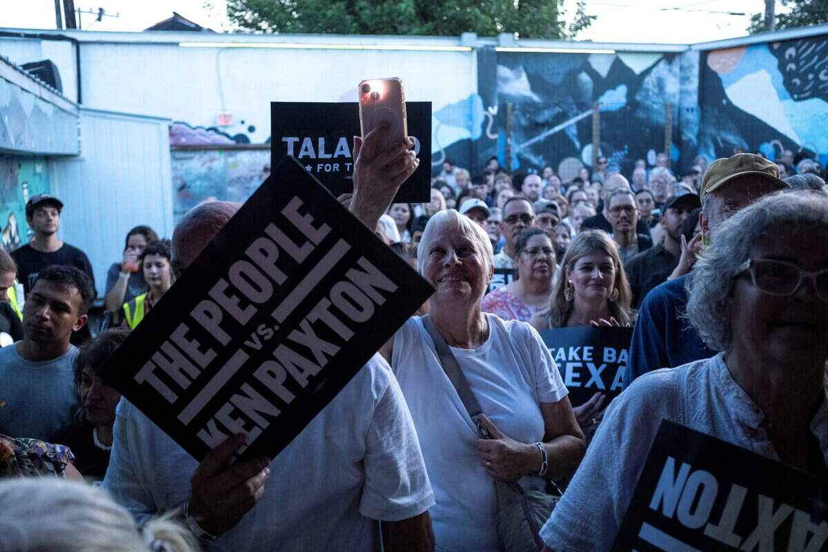 People attend a rally for Democratic Senate candidate James Talarico in San Antonio.